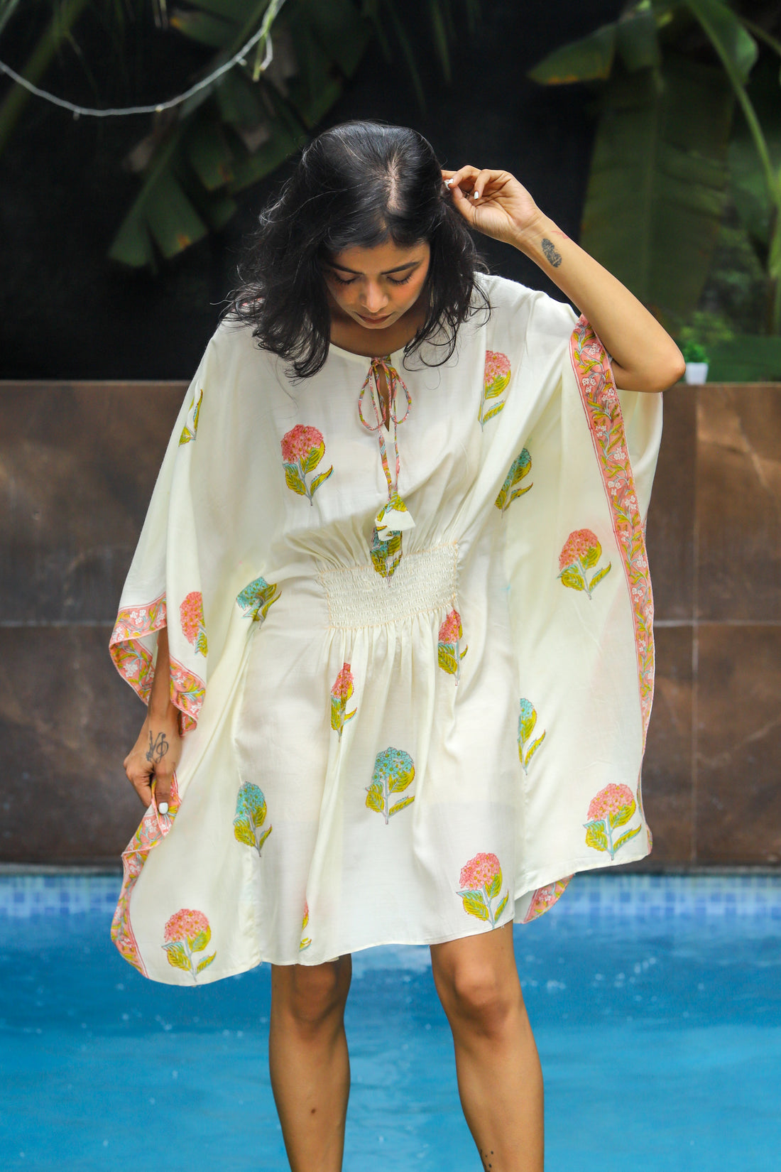 “Vama handblock printed modal short kaftan dress with intricate floral motifs, featuring a comfortable loose fit and V-neckline, perfect for casual summer wear.”