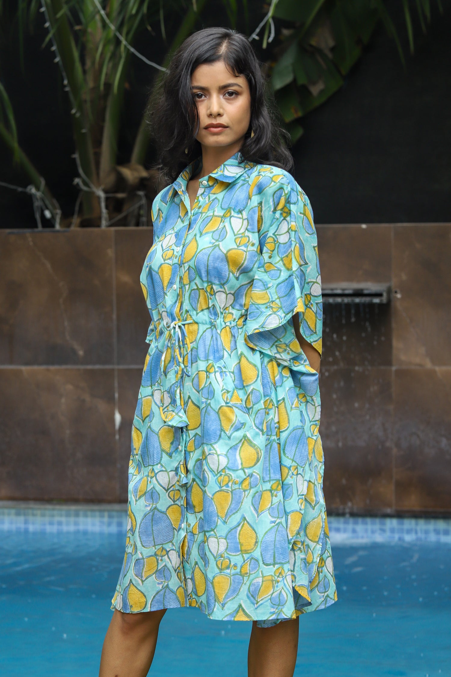 “Pallav handblock printed kaftan shirt dress in elegant floral patterns, featuring a relaxed fit and lightweight fabric, ideal for casual summer outings and beachwear.”