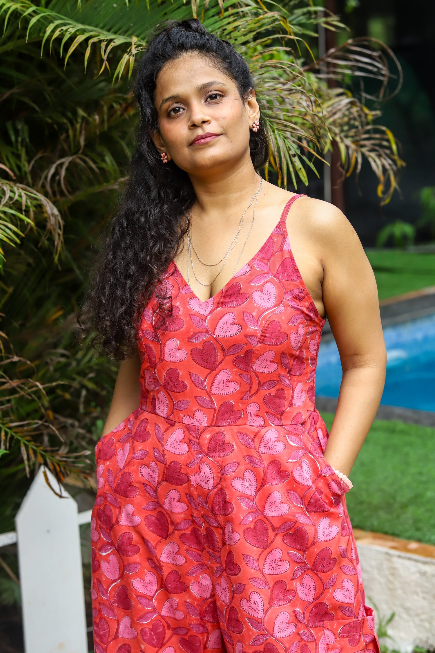 “Dilbahar handblock printed jumpsuit with floral motifs, sleeveless design, lightweight cotton fabric, perfect for casual summer wear by CULTURE KRAFT.”