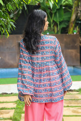 “Dhaari Flared Top with Balloon Sleeves, featuring a stylish striped pattern in lightweight fabric, ideal for casual and semi-formal occasions, by CULTURE KRAFT.”