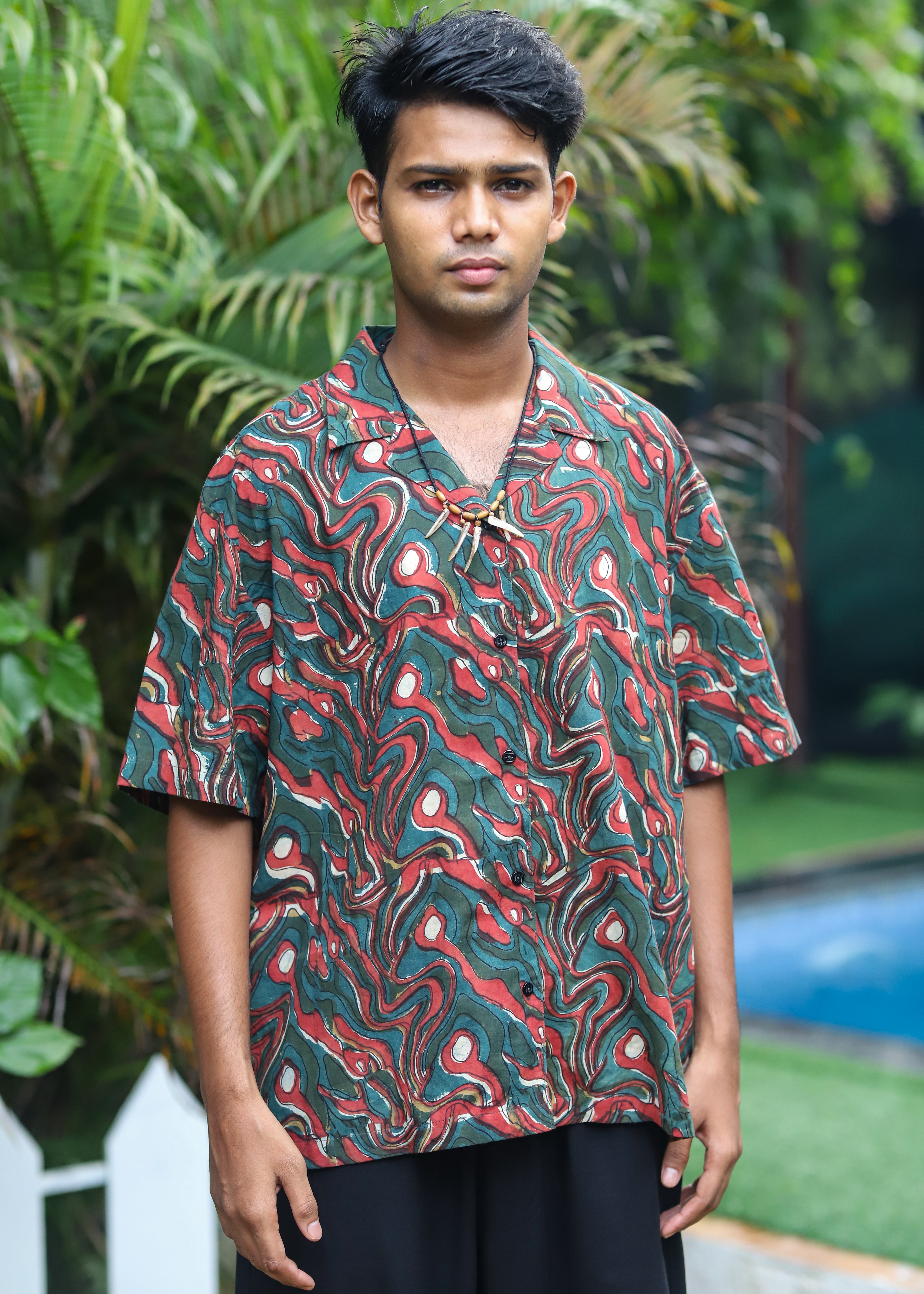 “Pravah unisex twin set featuring a casual beach shirt and matching shorts, in a vibrant print perfect for summer outings and beachwear.”