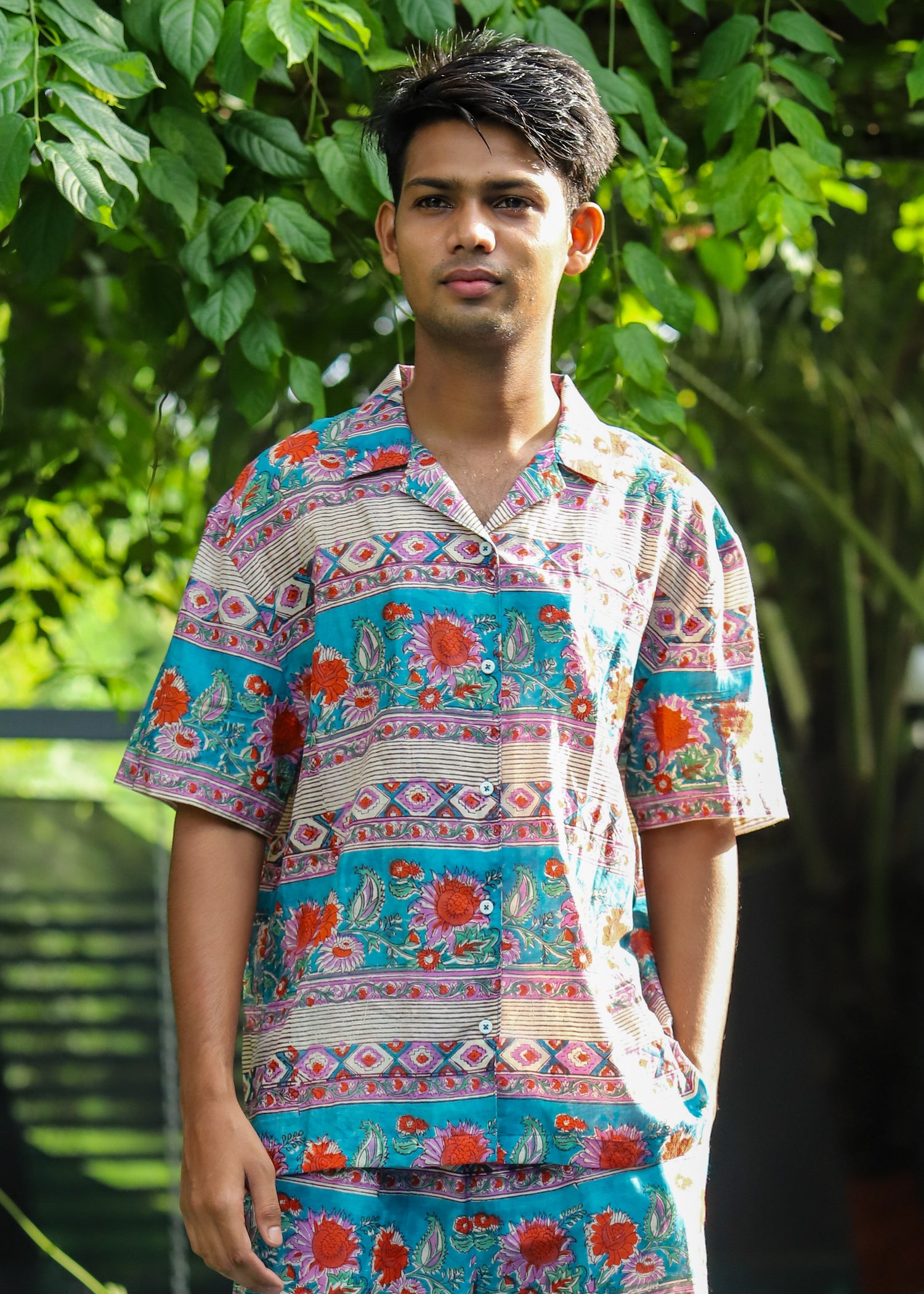 &quot;Rizan handblock printed unisex shirt with traditional floral motifs, made from breathable cotton, versatile for casual or festive wear by CULTURE KRAFT.&quot;