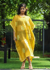 "Zard hand applique organdy beach kaftan with intricate detailing, sheer lightweight fabric, perfect for resort wear."