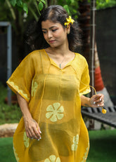 "Zard hand applique organdy beach kaftan with intricate detailing, sheer lightweight fabric, perfect for resort wear."