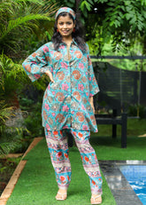 “Set of 2 Parwan tunic shirt and palazzos with matching headband, featuring handblock floral print in lightweight fabric, ideal for casual and festive wear.”