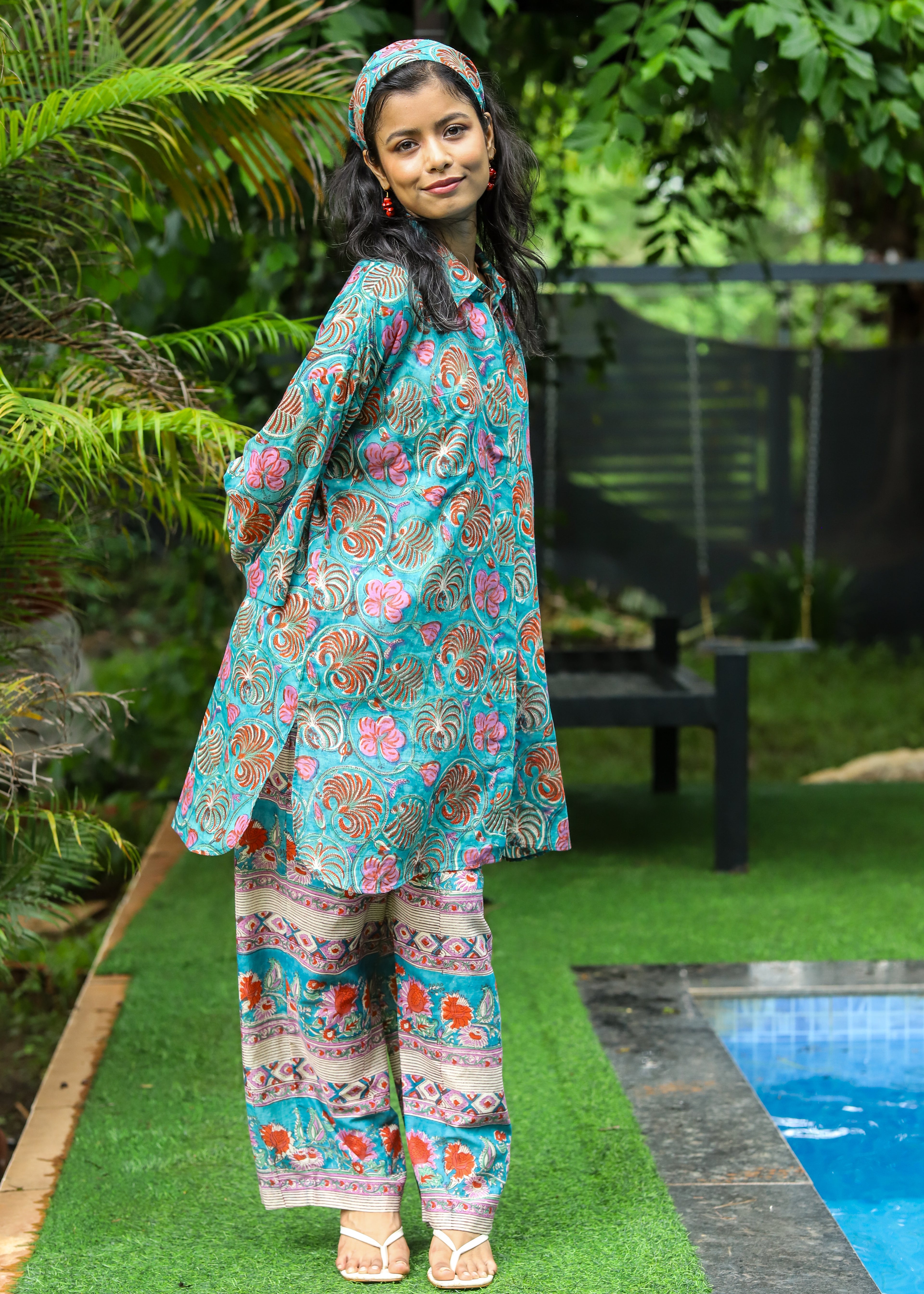 “Set of 2 Parwan tunic shirt and palazzos with matching headband, featuring handblock floral print in lightweight fabric, ideal for casual and festive wear.”