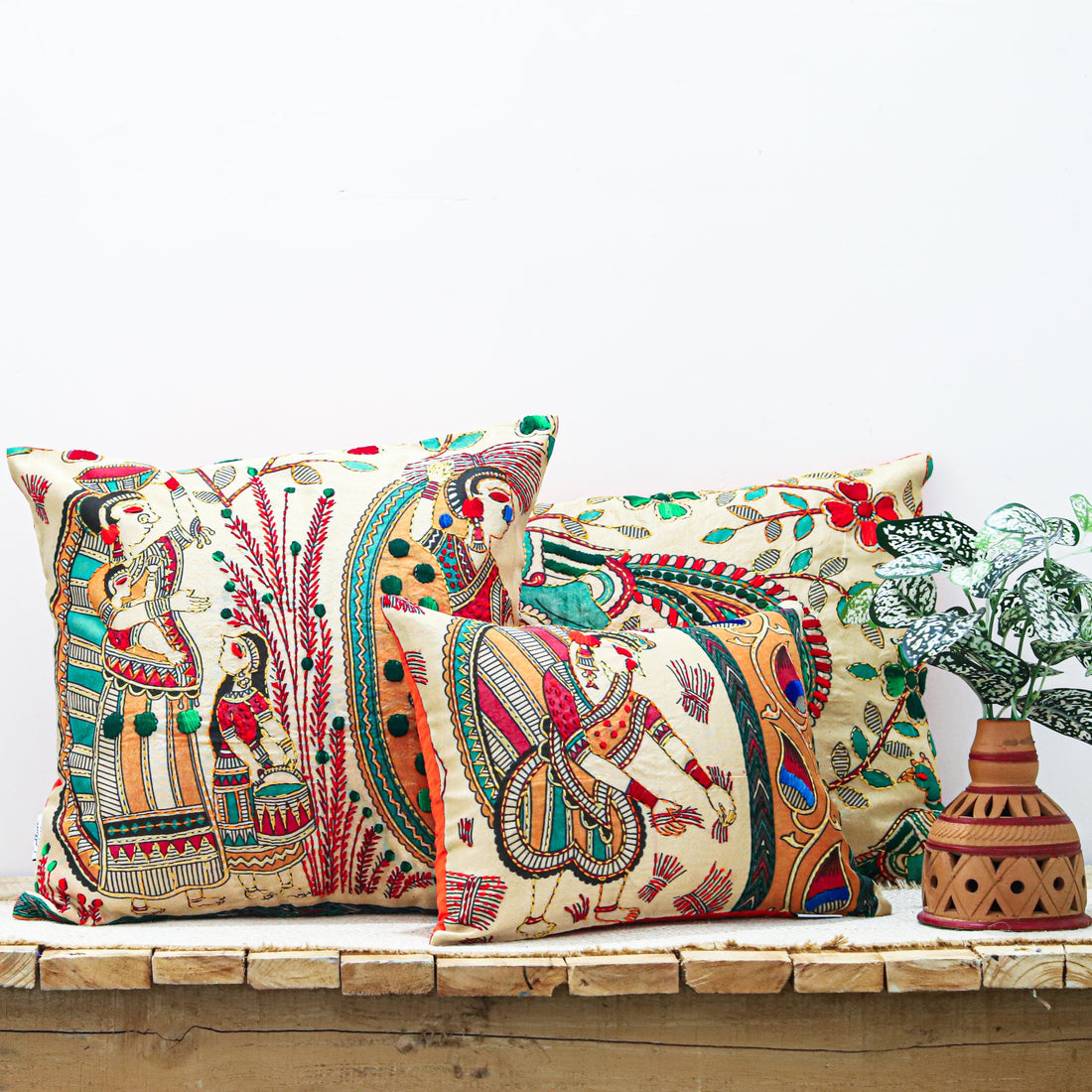 &quot;Block printed and hand-embroidered cushion cover featuring intricate designs, available in three sizes: 16x12 inches, 18x18 inches, and 24x16 inches. Perfect for adding a touch of artistry and elegance to any space.&quot;