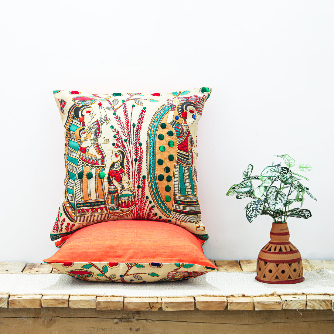 &quot;Block printed and hand-embroidered cushion cover featuring intricate designs, available in three sizes: 16x12 inches, 18x18 inches, and 24x16 inches. Perfect for adding a touch of artistry and elegance to any space.&quot;