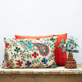 "Block printed and hand-embroidered cushion cover featuring intricate designs, available in three sizes: 16x12 inches, 18x18 inches, and 24x16 inches. Perfect for adding a touch of artistry and elegance to any space."