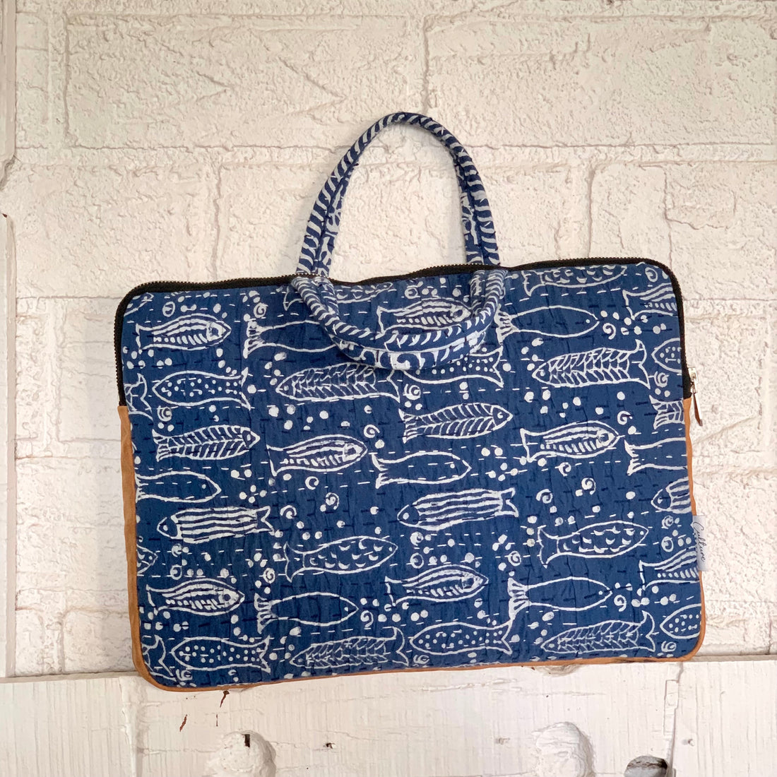 &quot;Indigo laptop bag with Dabu handblock prints, featuring a traditional Matsya fish motif. Stylish and eco-friendly, perfect for everyday use.&quot;