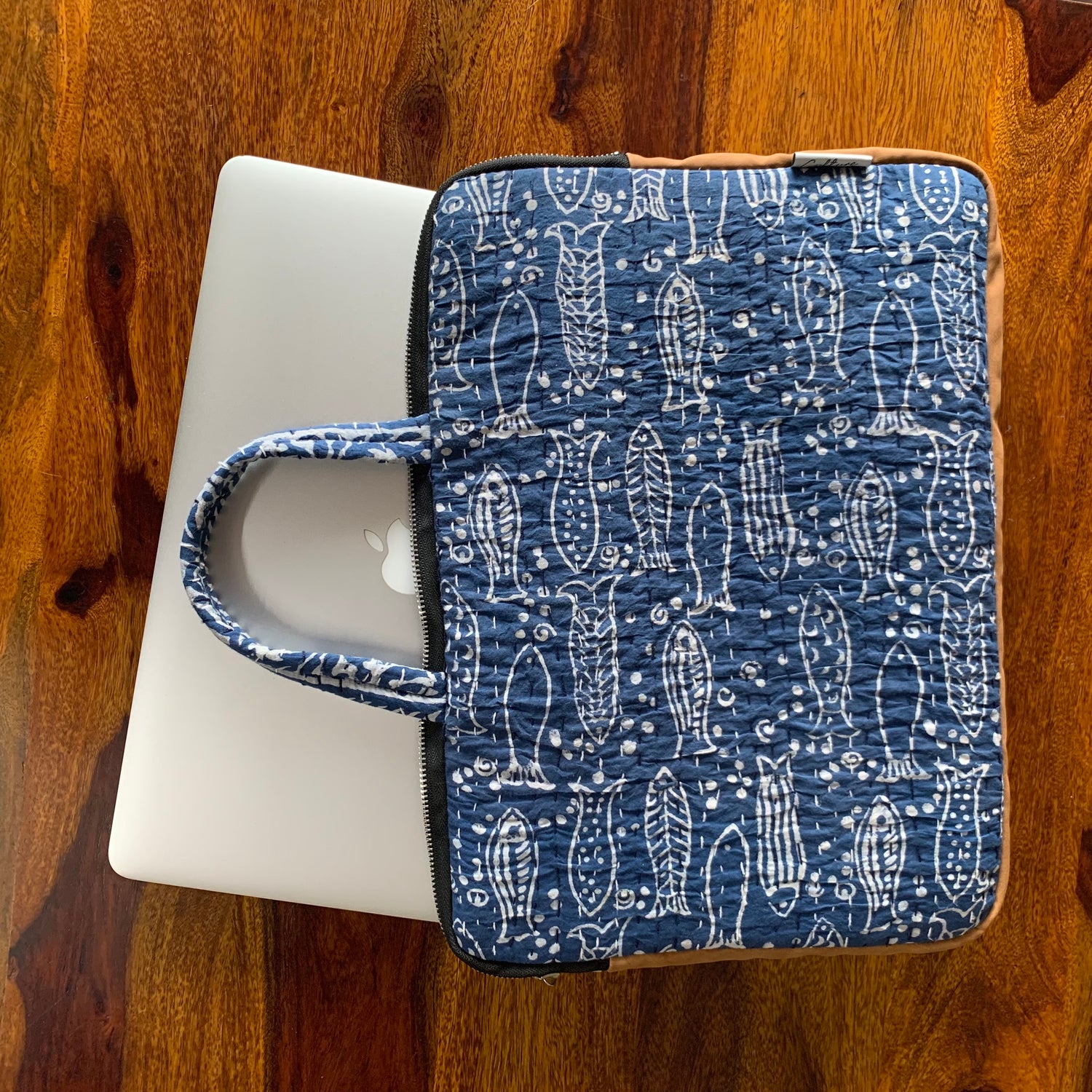 &quot;Indigo laptop bag with Dabu handblock prints, featuring a traditional Matsya fish motif. Stylish and eco-friendly, perfect for everyday use.&quot;