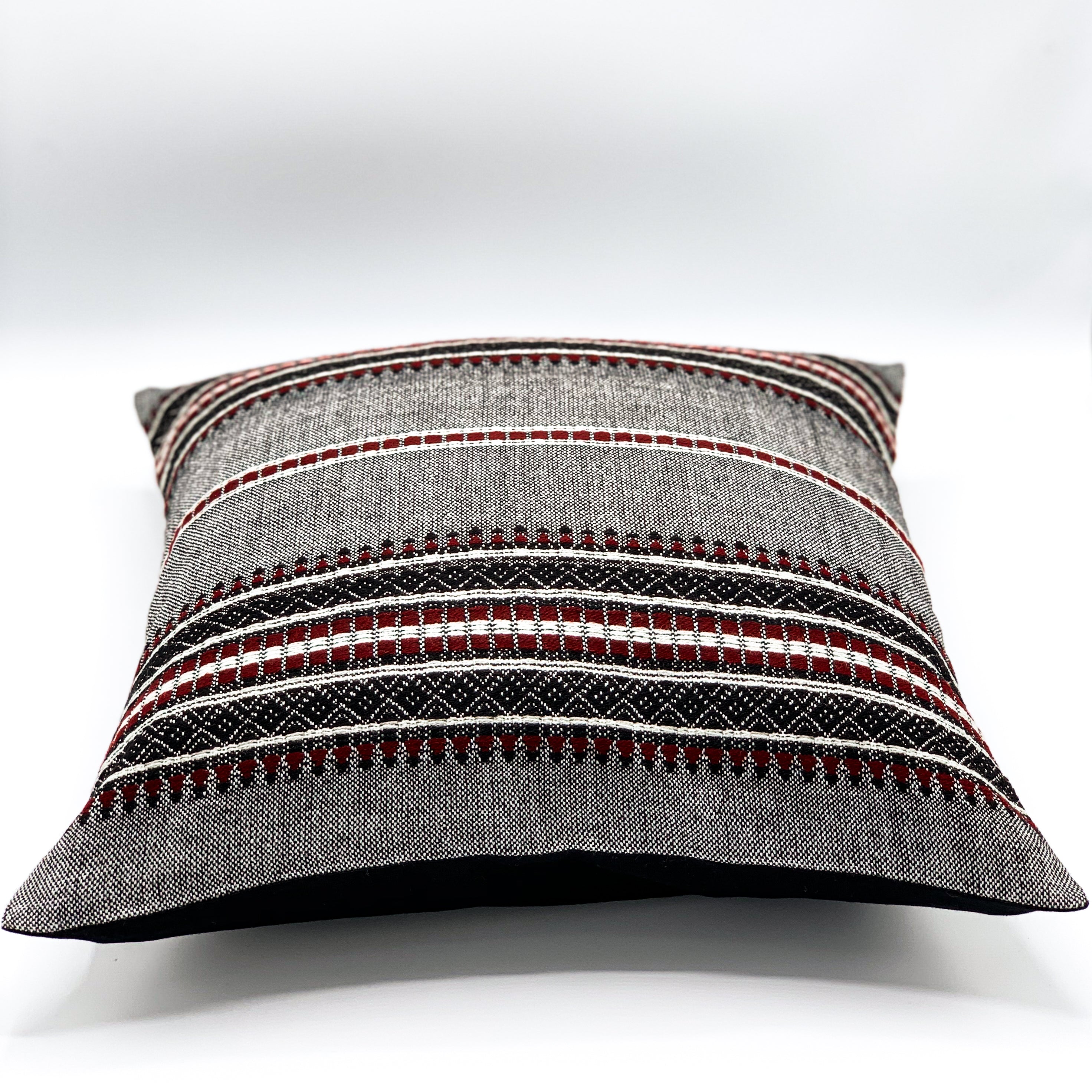 Handloom jacquard cushion cover in a 16x16 size, featuring intricate patterns and rich textures, perfect for adding a touch of elegance to your home decor.