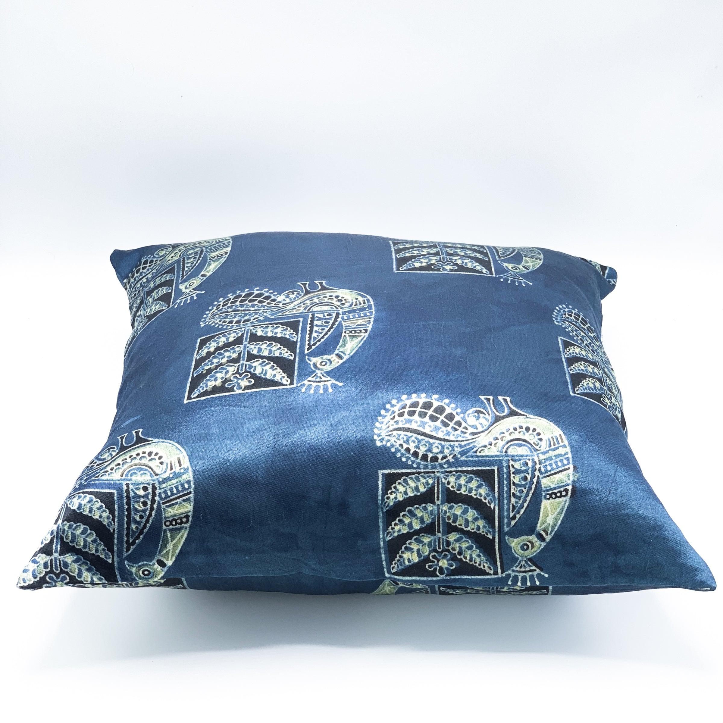 Mayur Ajrakh block printed Mashru cushion cover available in sizes 16x16, 18x18, and 24x24, featuring intricate traditional patterns on luxurious fabric.