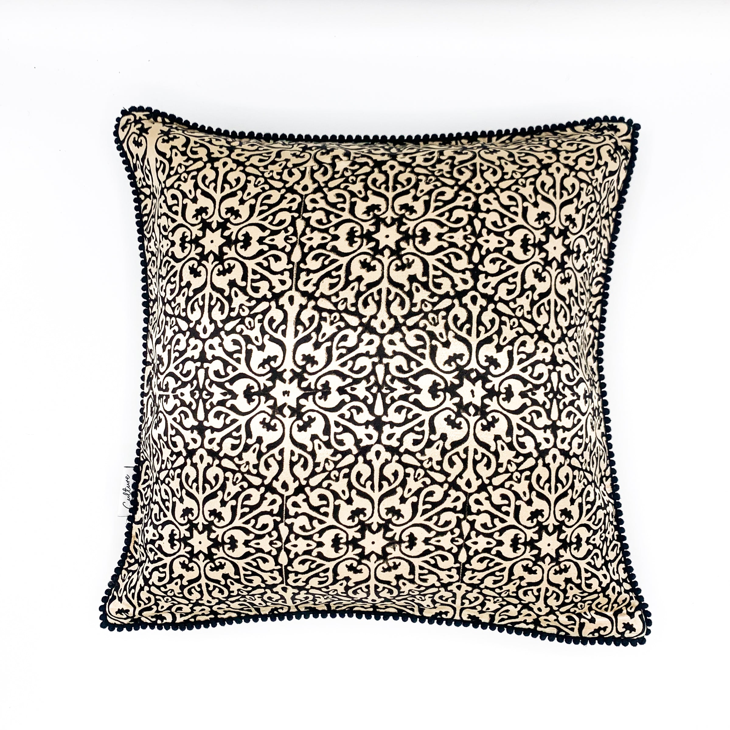 NOOR Ajrakh block-printed mashru cushion cover in rich, earthy tones featuring intricate patterns, available in sizes 16x16 inches and 18x18 inches. Perfect for adding a touch of elegance and cultural charm to your home decor