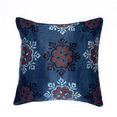 Ajrakh block printed cushion cover in vibrant colors featuring intricate patterns, made from soft Mashru fabric, measuring 16x16 inches. Perfect for adding a touch of ethnic charm to any space.