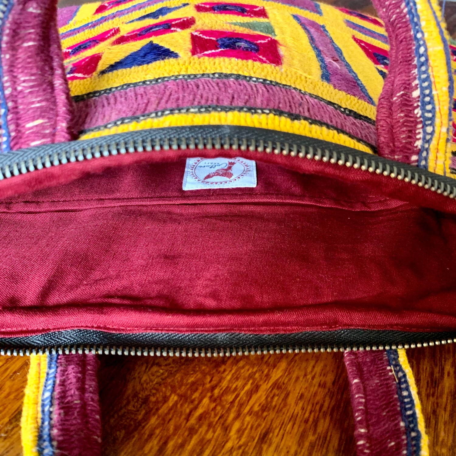 &quot;ABHLA - Vintage Kutch Embroidery Laptop Bag with intricate, vibrant traditional designs, showcasing handcrafted details and cultural artistry.&quot;